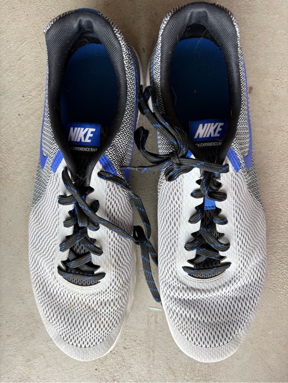 Nike Men’s White and Blue Mesh Running Sneakers